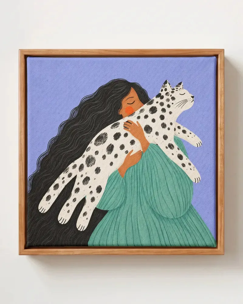 Spotted Cat Embrace square canvas print, woman hugging a spotted cat, in solid pine floating frame